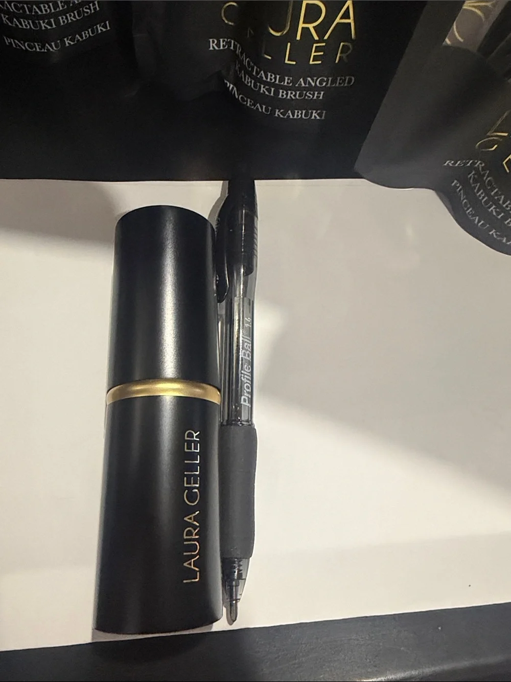 Laura Geller Black and Gold Retractable Angled Kabuki Brush brand new